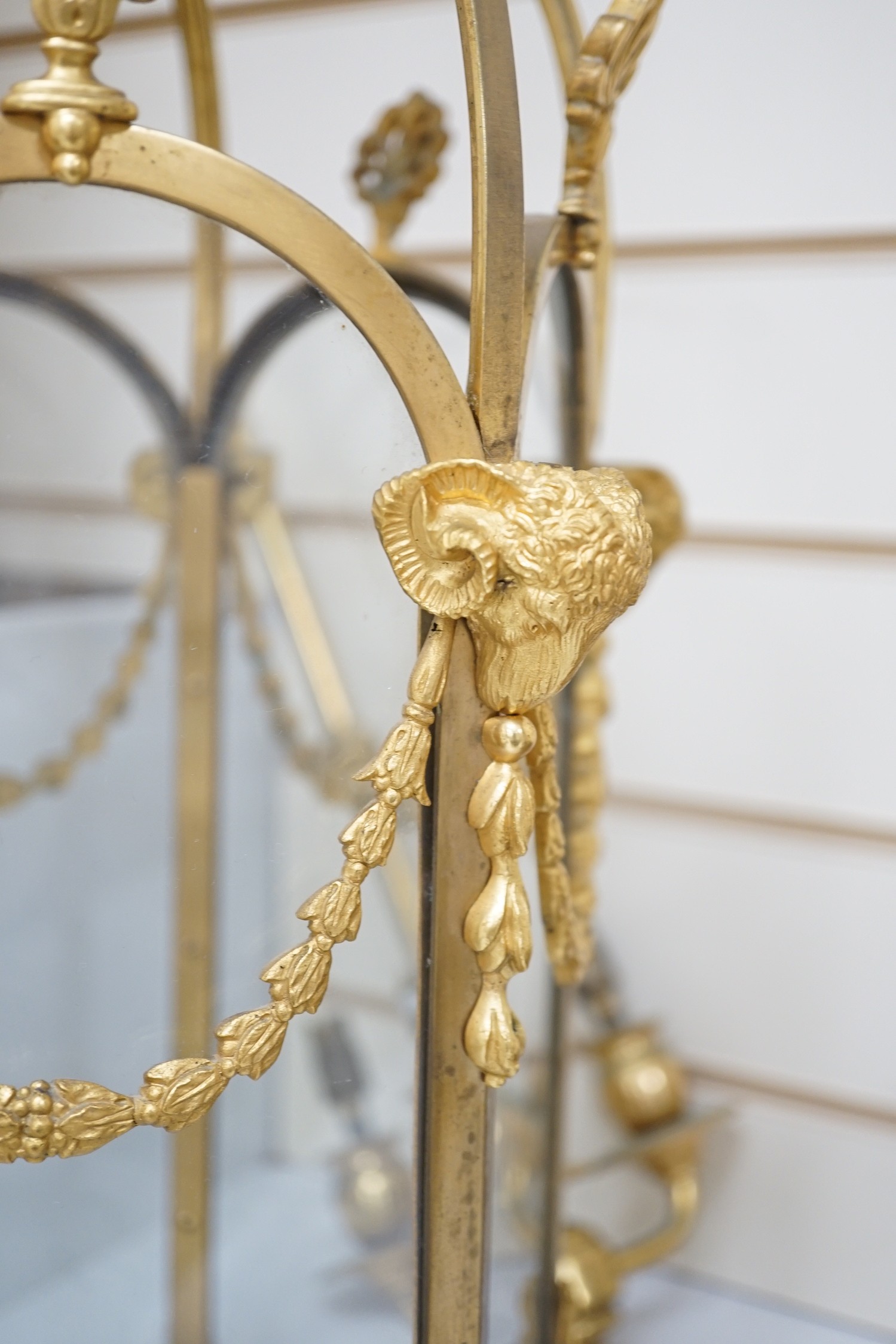 An Adam revival ormolu hall lantern, early 20th century, 58 cm high to suspension loop